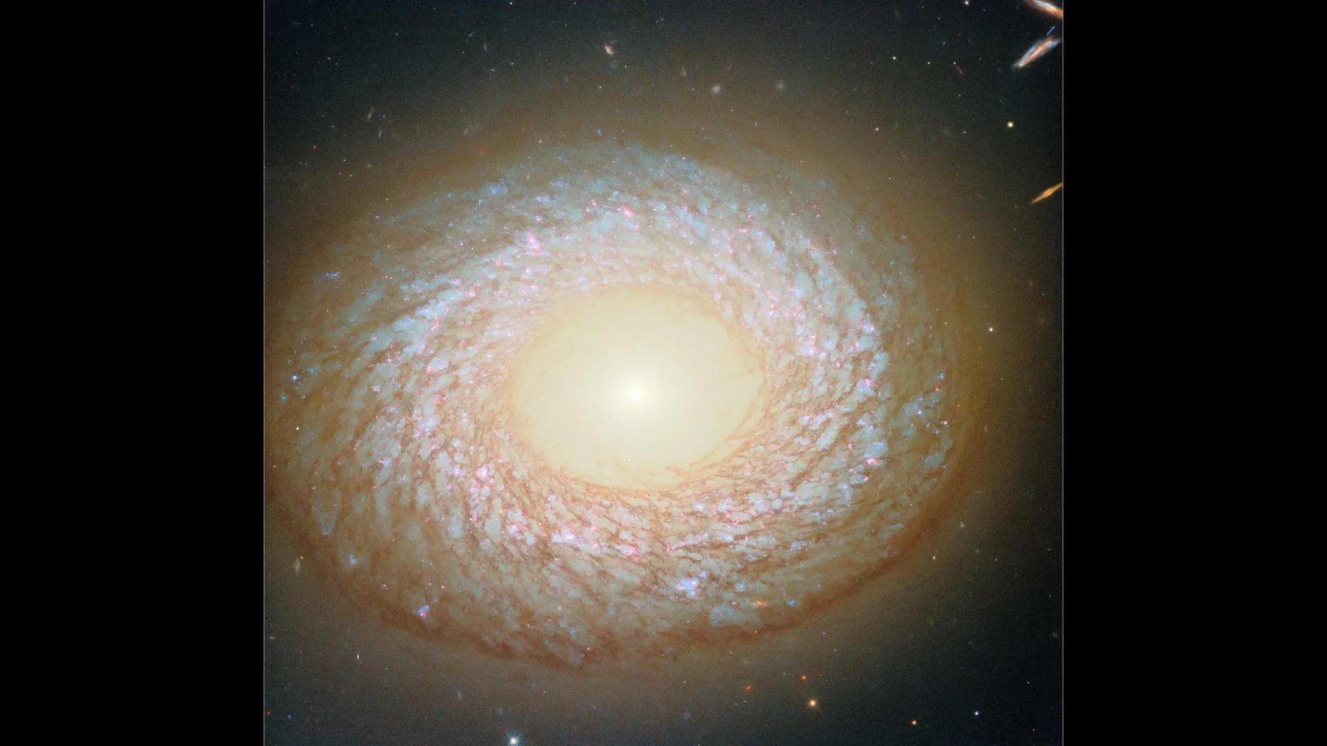 Hubble finds a hybrid galaxy with a mysterious and violent past