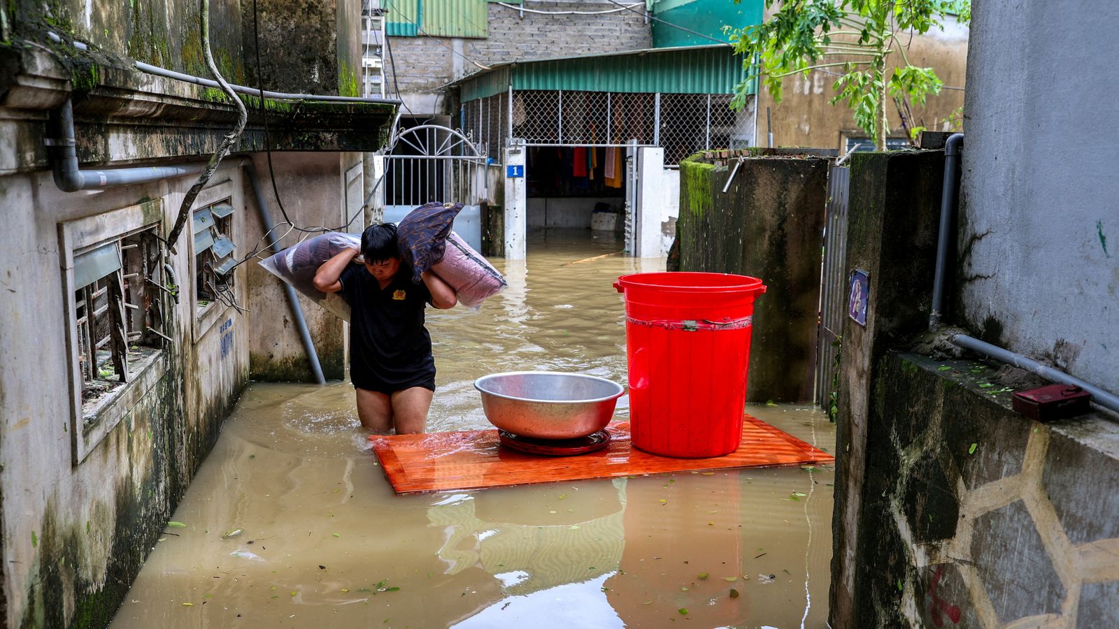 Torrential rain after Typhoon Bualoi leaves at least 26 dead in Vietnam amid flooding and landslides | World News