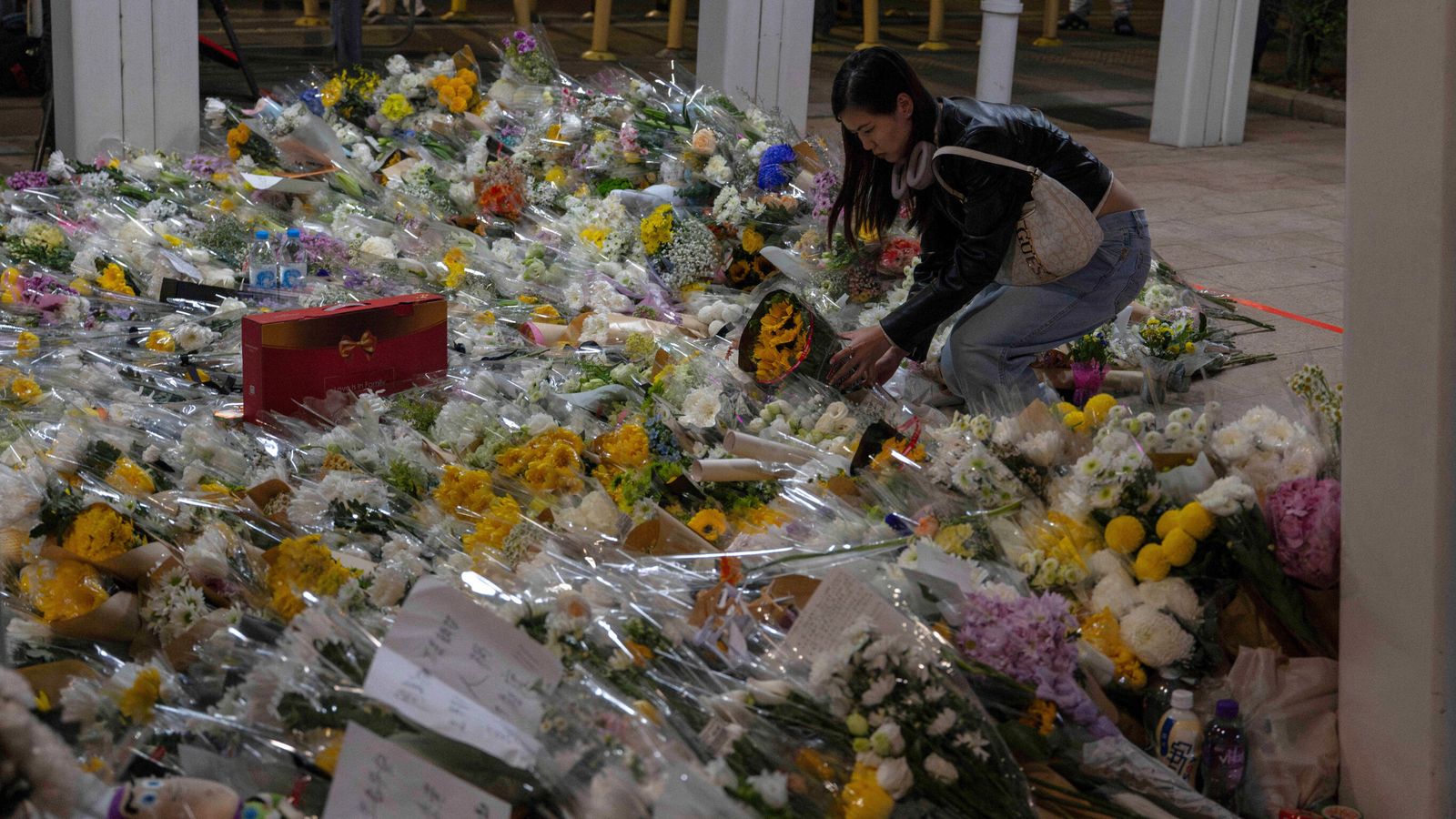 Hong Kong mourns those lost to fire as investigators search for remains | World News