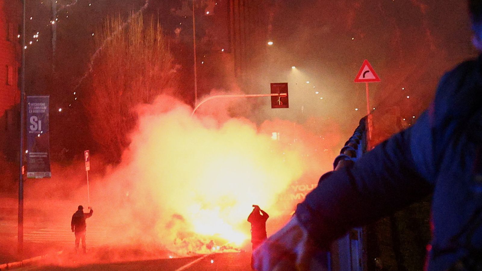Italian police fire tear gas at protesters near Olympics venue | World News